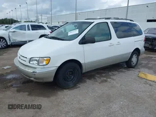 1999 Toyota Sienna LE with VIN 4T3ZF13C1XU152733, listed as a IAAI auction lot 40819395 with 184,540 mi miles. Bid and sale history available at carsss.com. Image 17.