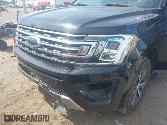 2019 Ford Expedition XLT with VIN 1FMJU1HT5KEA84864, listed as a IAAI auction lot 40174691 with 119,758 mi miles. Bid and sale history available at carsss.com. Image 6.
