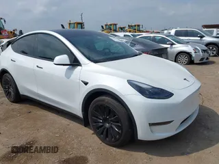 2023 Tesla Model Y Long Range with VIN 7SAYGAEEXPF776370, listed as a IAAI auction lot 42127512 with 27,120 mi miles and . Bid and sale history available at DreamBid. Image 1.