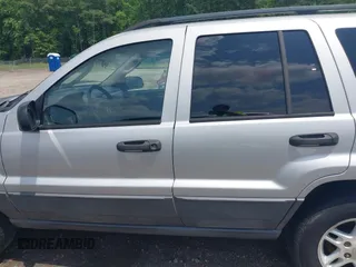2004 Jeep Grand Cherokee Laredo with VIN 1J4GX48N04C435603, listed as a IAAI auction lot 42274197 with 256,163 mi miles and . Bid and sale history available at DreamBid. Image 14.