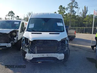 2019 Ford Transit with VIN 1FTYE2CM7KKB76498, listed as a IAAI auction lot 41969392 with 180,444 mi miles and . Bid and sale history available at carsss.com. Image 12.