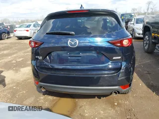 2018 Mazda CX-5 Touring with VIN JM3KFBCM5J0369799, listed as a IAAI auction lot 41895364 with 76,801 mi miles and . Bid and sale history available at carsss.com. Image 16.