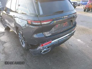 2023 Jeep Grand Cherokee Overland with VIN 1C4RJHDGXP8864365, listed as a IAAI auction lot 40502141 with 3,911 mi miles and . Bid and sale history available at DreamBid. Image 6.