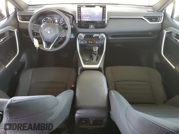 2022 Toyota RAV4 Hybrid SE with VIN 4T3T6RFV7NU103423, listed as a Copart auction lot 59709215 with 27,595 mi miles and Salvage title. Bid and sale history available at DreamBid. Image 8.