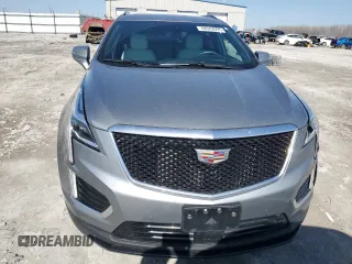 2023 Cadillac XT5 AWD Sport with VIN 1GYKNGRS7PZ133622, listed as a Copart auction lot 48342095 with 63,008 mi miles and Salvage title. Bid and sale history available at DreamBid. Image 5.