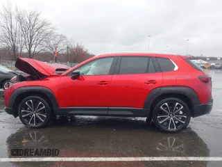 2025 Mazda CX-50 Premium z VIN 7MMVABDY3SN329439, wystawiony jako IAAI lot #41867334 z przebiegiem 3 508 mil mil oraz . Historia ofert i sprzedaży dostępna na DreamBid. Obrazek 14.