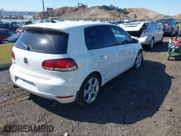 2010 Volkswagen GTI with VIN WVWHV7AJ3AW302532, listed as a IAAI auction lot 41794357 with 141,061 mi miles. Bid and sale history available at carsss.com. Image 4.