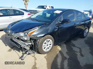 2020 Toyota Prius L Eco z VIN JTDKARFU6L3104385, wystawiony jako IAAI lot #41922029 z przebiegiem 123 235 mil mil oraz . Historia ofert i sprzedaży dostępna na DreamBid. Obrazek 17.