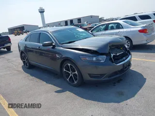 2015 Ford Taurus SEL with VIN 1FAHP2H81FG123199, listed as a IAAI auction lot 42431645 with 183,456 mi miles and . Bid and sale history available at DreamBid. Image 1.