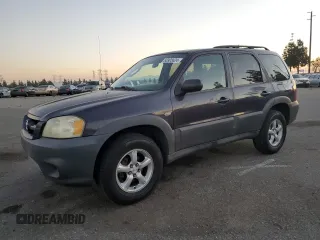 2006 Mazda Tribute i with VIN 4F2YZ02Z16KM15975, listed as a Copart auction lot 83905624 with 235,436 mi miles and Salvage Title. Bid and sale history available at carsss.com. Image 1.