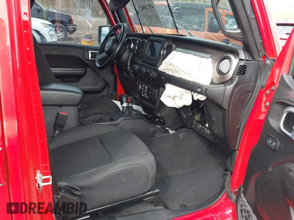 2021 Jeep Gladiator Freedom z VIN 1C6HJTAG0ML547293, wystawiony jako IAAI lot #41926067 z przebiegiem 57 696 mil mil oraz . Historia ofert i sprzedaży dostępna na DreamBid. Obrazek 5.