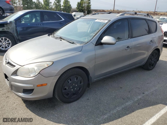 2011 Hyundai Elantra Touring SE with VIN KMHDC8AE2BU121539, listed as a Copart auction lot 72261384 with 156,516 mi miles and Salvage Title. Bid and sale history available at carsss.com. Image 1.