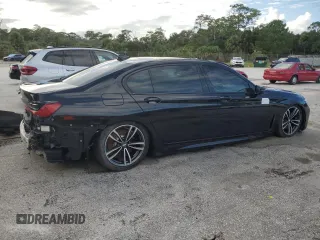 2022 BMW 7 Series 750i xDrive with VIN WBA7U2C01NCK83702, listed as a Copart auction lot 74327704 with Not provided miles and Salvage title. Bid and sale history available at DreamBid. Image 3.