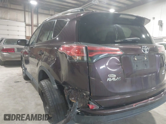 2018 Toyota RAV4 LE with VIN 2T3BFREV0JW759714, listed as a IAAI auction lot 41823084 with 119,909 mi miles and . Bid and sale history available at DreamBid. Image 6.