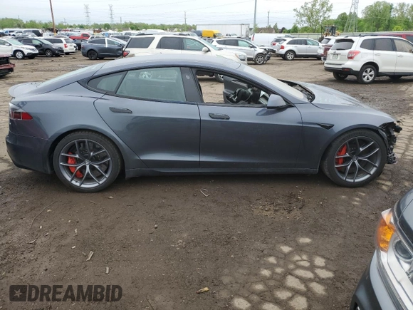2022 Tesla Model S Plaid with VIN 5YJSA1E63NF460223, listed as a Copart auction lot 56127155 with 50,419 mi miles and Clean title. Bid and sale history available at DreamBid. Image 4.