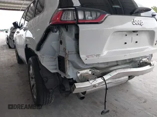 2022 Jeep Cherokee Latitude Lux z VIN 1C4PJLMXXND501689, wystawiony jako IAAI lot #42401720 z przebiegiem 34 037 mil mil oraz . Historia ofert i sprzedaży dostępna na DreamBid. Obrazek 6.