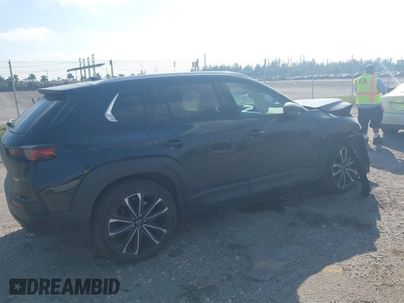 2023 Mazda CX-50 S Premium Plus with VIN 7MMVABEM1PN141344, listed as a IAAI auction lot 41473823 with 12,120 mi miles and . Bid and sale history available at DreamBid. Image 4.