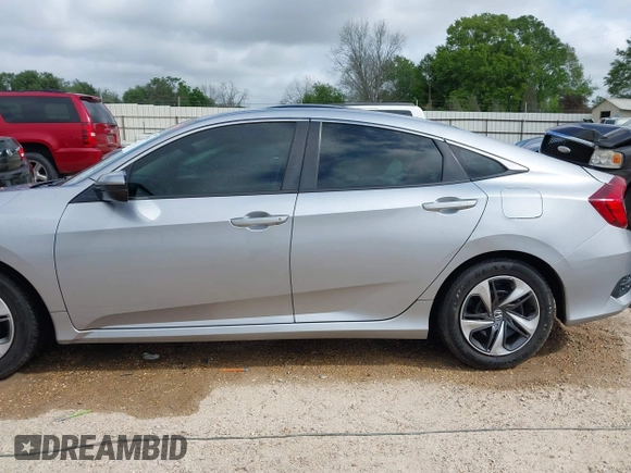 2019 Honda Civic LX with VIN 19XFC2F60KE043806, listed as a IAAI auction lot 41915894 with 123,141 mi miles and . Bid and sale history available at DreamBid. Image 15.