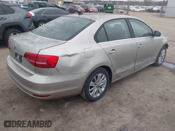 2015 Volkswagen Jetta Sedan 1.8T SE w/Connectivity with VIN 3VWD07AJ9FM326125, listed as a IAAI auction lot 41531163 with 141,284 mi miles. Bid and sale history available at carsss.com. Image 4.
