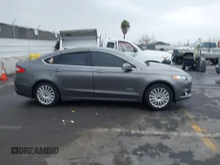 2013 Ford Fusion Titanium with VIN 3FA6P0SUXDR332271, listed as a IAAI auction lot 42174434 with 201,404 mi miles and . Bid and sale history available at DreamBid. Image 13.