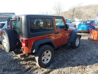 2014 Jeep Wrangler Sport with VIN 1C4AJWAG6EL289004, listed as a IAAI auction lot 41751707 with 85,750 mi miles. Bid and sale history available at carsss.com. Image 4.