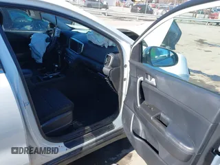 2020 Kia Sportage LX with VIN KNDPMCAC4L7792355, listed as a IAAI auction lot 41433828 with 67,139 mi miles. Bid and sale history available at carsss.com. Image 5.