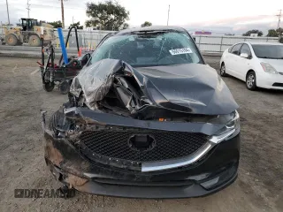 2021 Mazda CX-5 Sport with VIN JM3KFABM3M1334284, listed as a Copart auction lot 86915194 with 0 mi miles and Salvage Title. Bid and sale history available at carsss.com. Image 5.