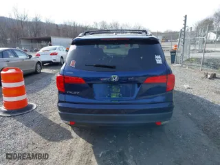 2017 Honda Pilot EX-L with VIN 5FNYF5H52HB031634, listed as a IAAI auction lot 41145133 with 164,668 mi miles. Bid and sale history available at carsss.com. Image 16.