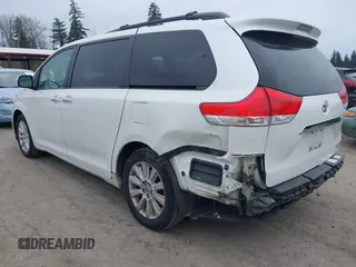 2014 Toyota Sienna Ltd with VIN 5TDDK3DC5ES073175, listed as a IAAI auction lot 41818572 with 107,971 mi miles. Bid and sale history available at carsss.com. Image 3.