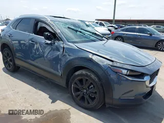 2022 Mazda CX-30 S Carbon Edition with VIN 3MVDMBCL6NM410330, listed as a IAAI auction lot 42107426 with 30,277 mi miles and . Bid and sale history available at DreamBid. Image 1.
