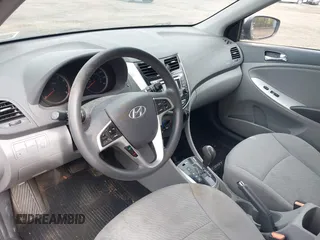 2014 Hyundai Accent GLS with VIN KMHCU4AE9EU761298, listed as a IAAI auction lot 42186032 with 118,848 mi miles and . Bid and sale history available at carsss.com. Image 5.