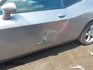 2013 Dodge Challenger SXT с VIN 2C3CDYAG7DH675121, выставлен на аукционе IAAI как лот 42623166 с пробегом 189 604 миль миль и . История ставок и продаж доступна на DreamBid. Изображение 6.