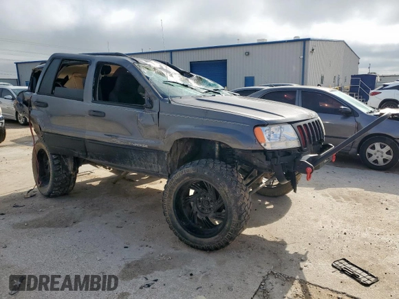 2003 Jeep Grand Cherokee Laredo with VIN 1J4GX48S63C604527, listed as a Copart auction lot 55996725 with Not provided miles and Non repairable. Bid and sale history available at DreamBid. Image 4.