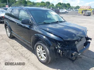 2017 Dodge Journey SXT z VIN 3C4PDDBG8HT512575, wystawiony jako IAAI lot #39710775 z przebiegiem 132 987 mil mil oraz . Historia ofert i sprzedaży dostępna na DreamBid. Obrazek 1.