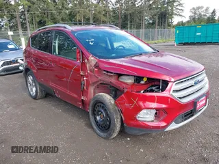 2018 Ford Escape Titanium with VIN 1FMCU9J99JUB44963, listed as a IAAI auction lot 42293113 with 68,803 mi miles and . Bid and sale history available at DreamBid. Image 1.