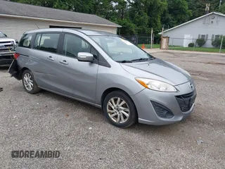 2014 Mazda 5 Sport with VIN JM1CW2BL5E0172594, listed as a IAAI auction lot 42628707 with 180,369 mi miles and . Bid and sale history available at DreamBid. Image 1.