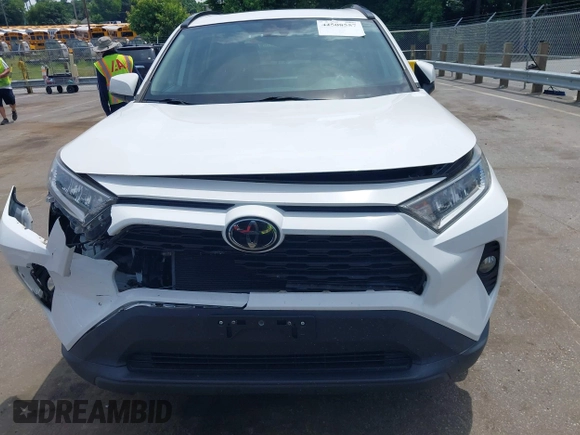 2019 Toyota RAV4 XLE with VIN 2T3P1RFV0KC008652, listed as a IAAI auction lot 42508557 with 87,684 mi miles and . Bid and sale history available at DreamBid. Image 12.