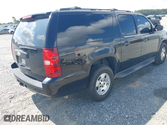 2013 Chevrolet Suburban LT with VIN 1GNSCJE03DR121628, listed as a IAAI auction lot 42629432 with 223,761 mi miles and . Bid and sale history available at DreamBid. Image 4.