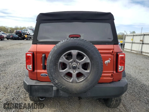 2024 Ford Bronco Big Bend z VIN 1FMDE7BH7RLA10353, wystawiony jako Copart lot #54209345 z przebiegiem 10 606 mil mil oraz Szkoda całkowita • Salvage title. Historia ofert i sprzedaży dostępna na DreamBid. Obrazek 6.