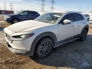2023 Mazda CX-30 S with VIN 3MVDMBAM1PM551577, listed as a Copart auction lot 42360715 with 18,765 mi miles and Salvage Title. Bid and sale history available at carsss.com. Image 1.