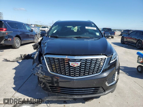 2022 Cadillac XT5 FWD Luxury with VIN 1GYKNAR45NZ118872, listed as a Copart auction lot 79676544 with 31,467 mi miles and Salvage title. Bid and sale history available at DreamBid. Image 5.