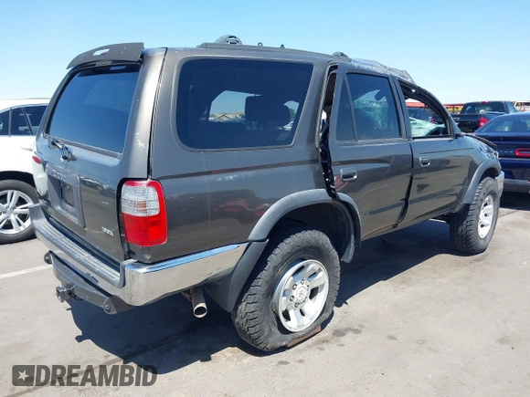1998 Toyota 4Runner SR5 with VIN JT3HN86R1W0143609, listed as a IAAI auction lot 42130942 with 277,576 mi miles and . Bid and sale history available at DreamBid. Image 4.