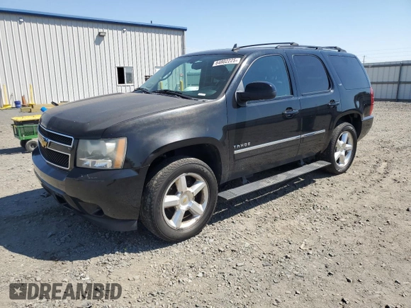 2010 Chevrolet Tahoe LTZ with VIN 1GNUKCE08AR117979, listed as a Copart auction lot 64802225 with 228,769 mi miles and Salvage title. Bid and sale history available at DreamBid. Image 1.