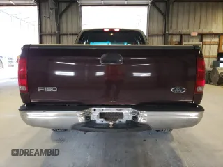 2000 Ford F-150 XL with VIN 1FTZX1726YKB41994, listed as a Copart auction lot 69300034 with Not provided miles and Salvage title. Bid and sale history available at DreamBid. Image 6.