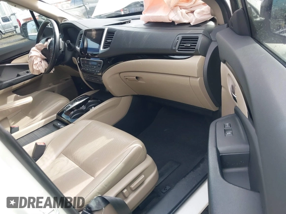 2016 Honda Pilot Elite with VIN 5FNYF6H05GB062868, listed as a IAAI auction lot 41804794 with 1 mi miles. Bid and sale history available at carsss.com. Image 5.