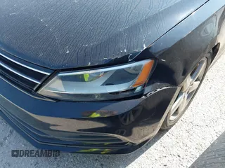 2015 Volkswagen Jetta SE with VIN 3VWD07AJ9FM411420, listed as a IAAI auction lot 40246311 with 141,456 mi miles and . Bid and sale history available at DreamBid. Image 12.