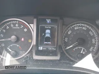 2023 Toyota Tacoma SR z VIN 3TMCZ5AN1PM637609, wystawiony jako IAAI lot #40345917 z przebiegiem 12 614 mil mil oraz . Historia ofert i sprzedaży dostępna na DreamBid. Obrazek 7.