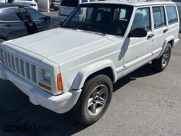 2000 Jeep Cherokee Classic with VIN 1J4FF58S4YL219673, listed as a Copart auction lot 48809075 with 198,334 mi miles and Salvage Title. Bid and sale history available at carsss.com. Image 2.