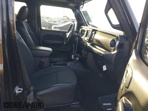 2023 Jeep Wrangler Sport S with VIN 1C4HJXDG2PW582318, listed as a IAAI auction lot 42011653 with 25,338 mi miles and . Bid and sale history available at DreamBid. Image 5.