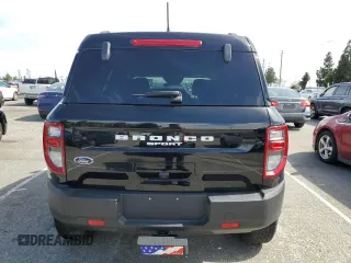 2023 Ford Bronco Sport Badlands z VIN 3FMCR9D97PRD35830, wystawiony jako Copart lot #56950865 z przebiegiem 7 401 mil mil oraz Szkoda całkowita • Salvage title. Historia ofert i sprzedaży dostępna na DreamBid. Obrazek 6.